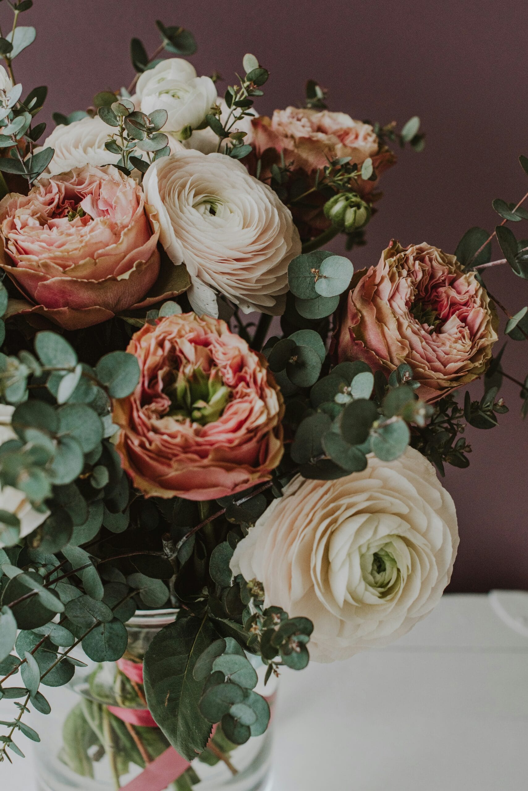 anita-austvika-JahpYE_K0ao-unsplash ingredients for a spell jar placed on clean background